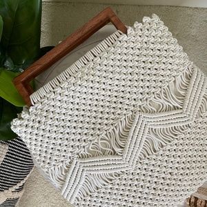 Woven bag with wooden handles by Shiraleah